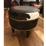 ML-ROUND OTTOMAN-COWHIDE OTTOMAN